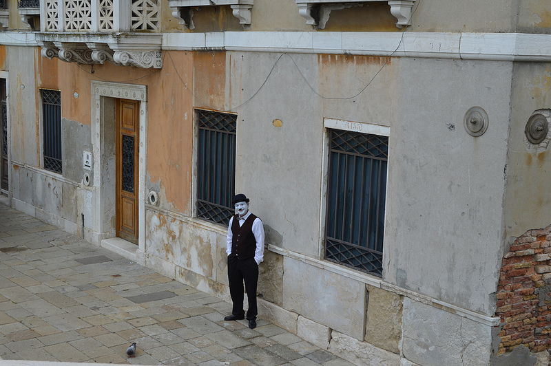 A fleeting moment in time, a random mime and a pigeon. 